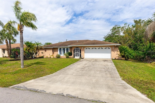 ranch-style home with an attached garage, driveway, a front lawn, and stucco siding