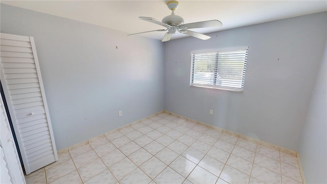 unfurnished room with a ceiling fan