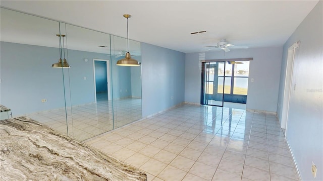 25225 Rampart Blvd Unit 604, Punta Gorda, FL 33983 - unfurnished room with light tile patterned flooring and ceiling fan