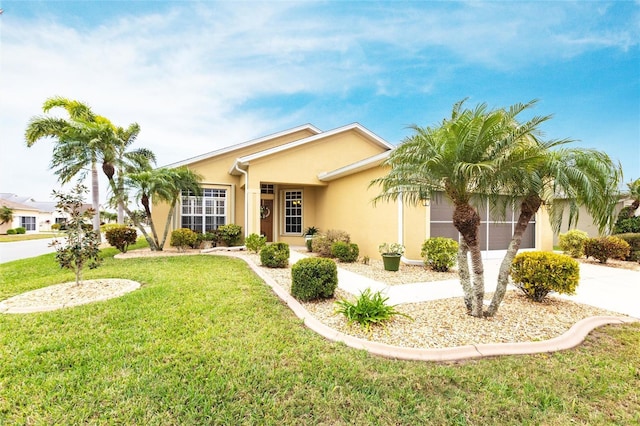 24321 Kintail Ct, Punta Gorda, FL 33980 - ranch-style house with a front yard and stucco siding