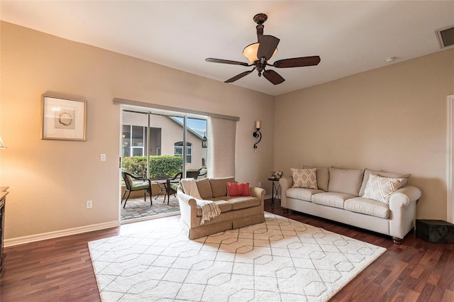 24321 Kintail Ct, Punta Gorda, FL 33980 - living area featuring ceiling fan, baseboards, and wood finished floors