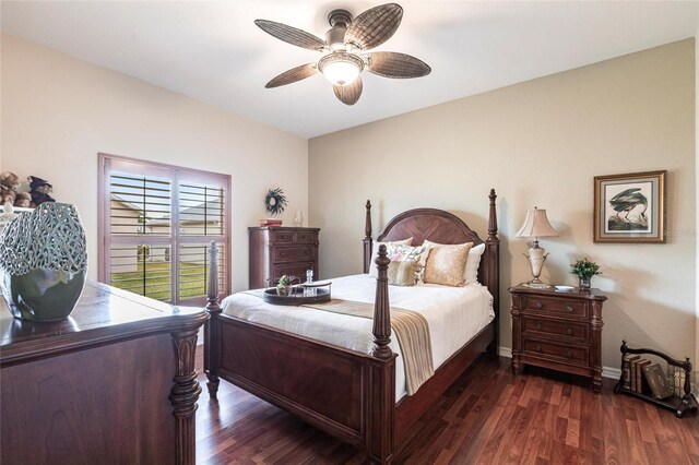 24321 Kintail Ct, Punta Gorda, FL 33980 - bedroom featuring baseboards, a ceiling fan, and wood finished floors