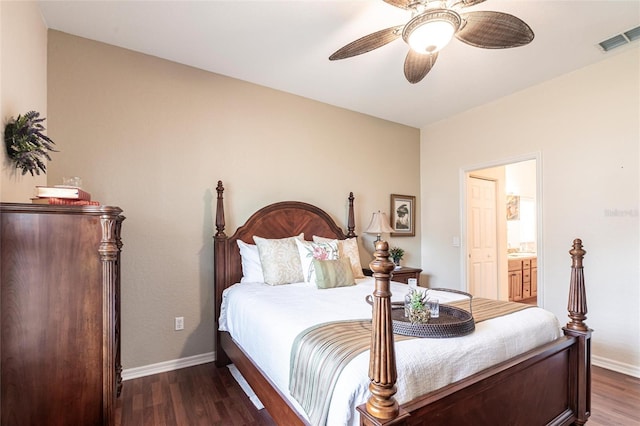 24321 Kintail Ct, Punta Gorda, FL 33980 - bedroom with connected bathroom, a ceiling fan, visible vents, wood finished floors, and baseboards