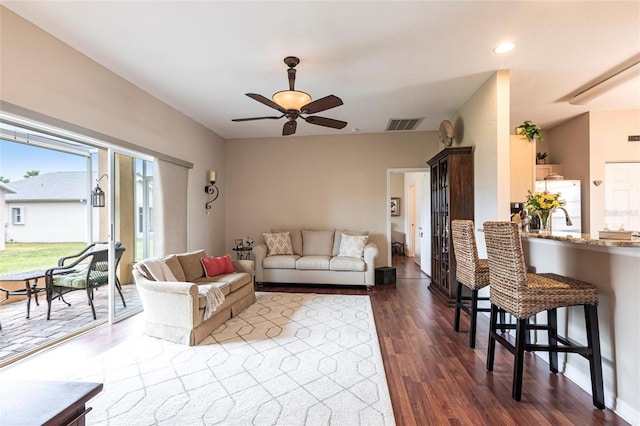 24321 Kintail Ct, Punta Gorda, FL 33980 - living room featuring recessed lighting, dark wood-style flooring, visible vents, and a ceiling fan