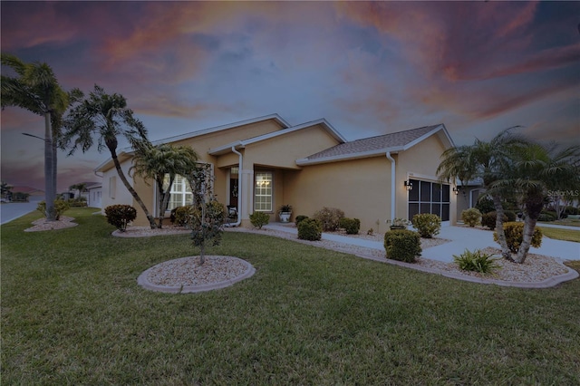 24321 Kintail Ct, Punta Gorda, FL 33980 - single story home featuring a front yard and stucco siding