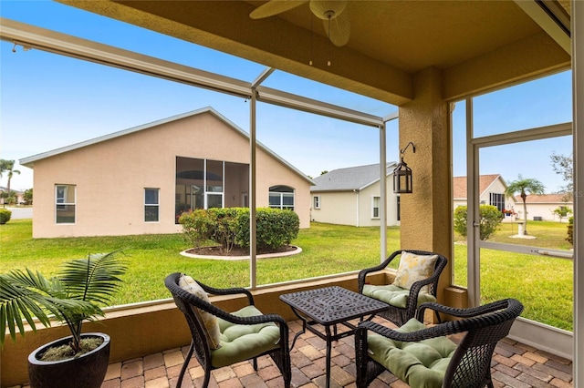 24321 Kintail Ct, Punta Gorda, FL 33980 - sunroom with a ceiling fan and an outdoor hangout area
