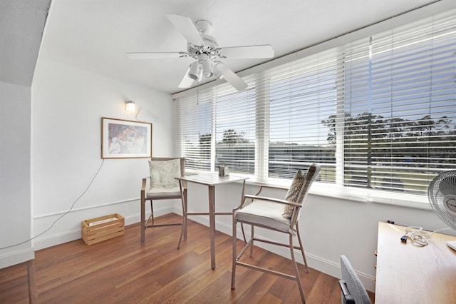 office with ceiling fan, baseboards, and wood finished floors