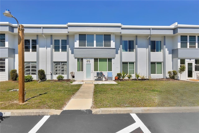 21287 Gertrude Ave Unit 211, Port Charlotte, FL 33952 - view of building exterior featuring uncovered parking