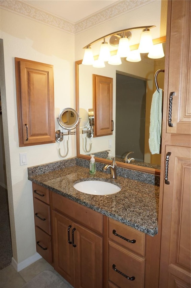 bathroom featuring vanity and baseboards