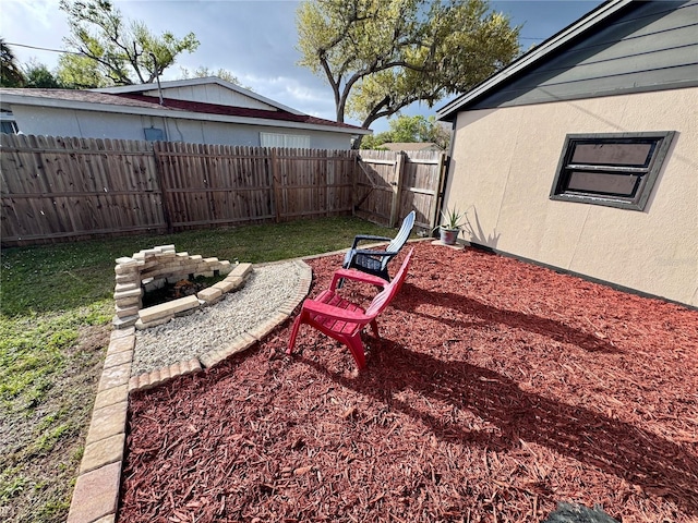 view of yard featuring a fenced backyard