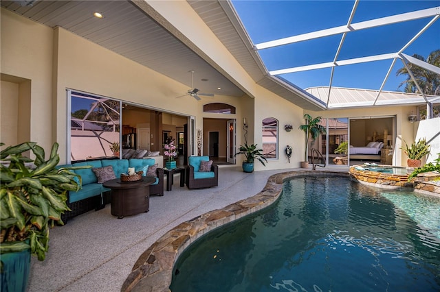 view of swimming pool with outdoor lounge area, a patio, a ceiling fan, and a lanai