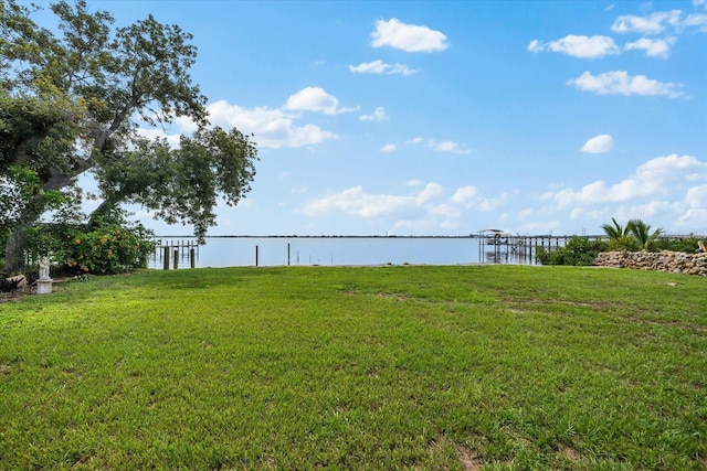 view of yard with a water view