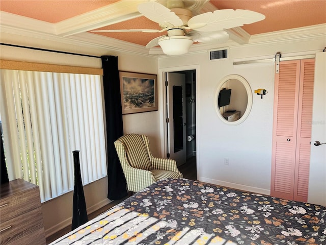 bedroom featuring crown molding, a closet, visible vents, beamed ceiling, and baseboards