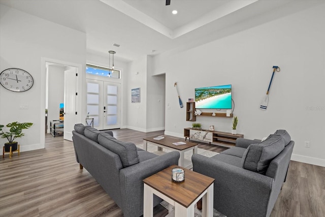 living room with french doors, recessed lighting, a ceiling fan, wood finished floors, and baseboards