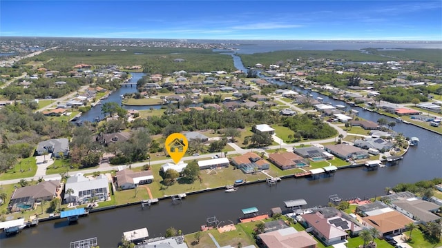 aerial view featuring a residential view and a water view