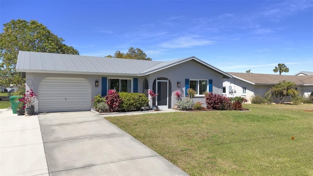 ranch-style home with a front yard, concrete driveway, an attached garage, and stucco siding