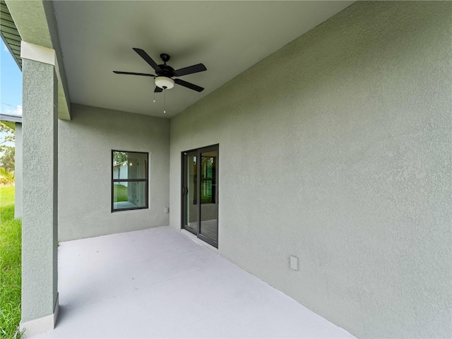 12156 Wellington Ave, Port Charlotte, FL 33981 - view of patio featuring ceiling fan