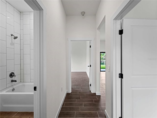 12156 Wellington Ave, Port Charlotte, FL 33981 - full bathroom featuring baseboards, tub / shower combination, and wood finished floors
