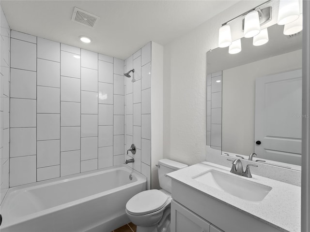 17331 Elmwood Ave, Port Charlotte, FL 33948 - full bathroom featuring vanity, bathing tub / shower combination, and a textured wall