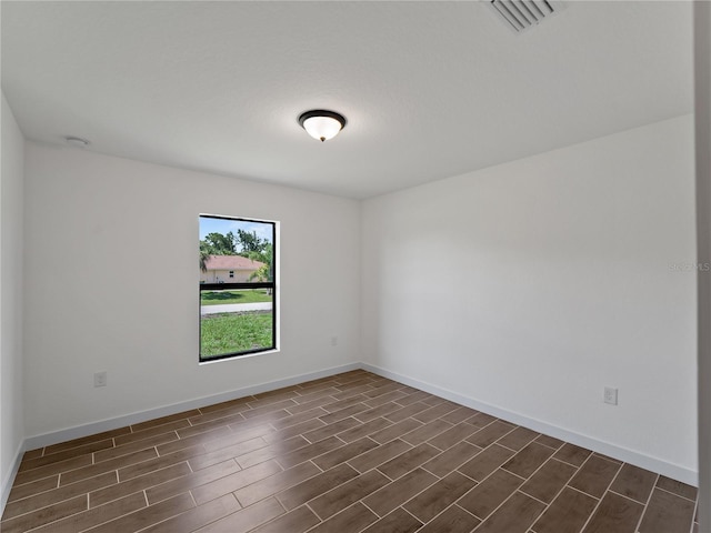 17331 Elmwood Ave, Port Charlotte, FL 33948 - spare room featuring wood tiled floors