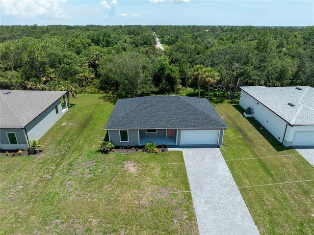 17331 Elmwood Ave, Port Charlotte, FL 33948 - view of subject property with a heavily wooded area