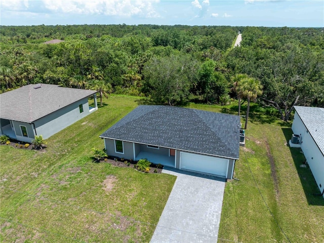 17331 Elmwood Ave, Port Charlotte, FL 33948 - aerial view of property and surrounding area featuring a heavily wooded area