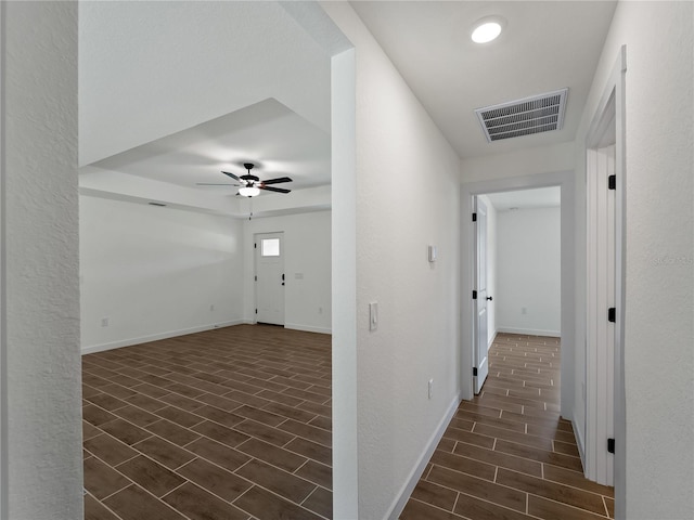 17331 Elmwood Ave, Port Charlotte, FL 33948 - hallway with wood tiled floors and baseboards