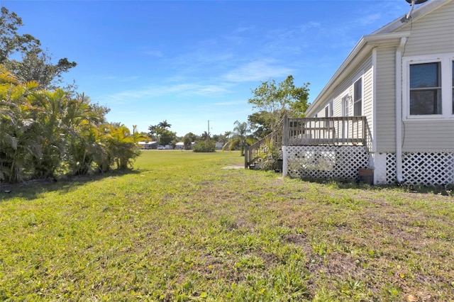 view of yard with a deck