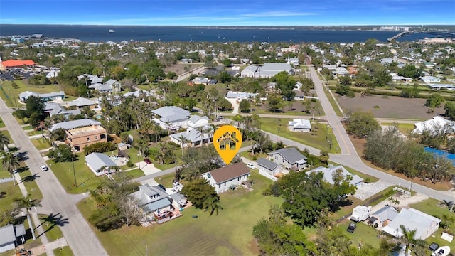 birds eye view of property with a residential view