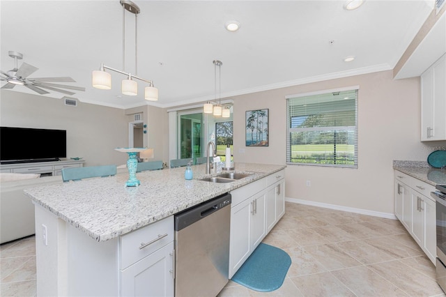 kitchen featuring white cabinets, ornamental molding, appliances with stainless steel finishes, and a sink