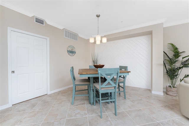 dining room with visible vents, crown molding, and baseboards