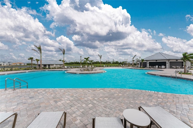 community pool with a patio