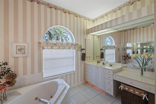 full bath featuring tile patterned floors, a tub with jets, wallpapered walls, and vanity