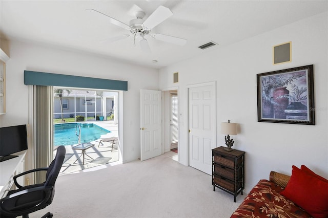 bedroom with visible vents, ceiling fan, carpet flooring, and access to outside