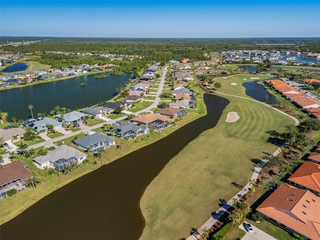 bird's eye view with a residential view, golf course view, and a water view