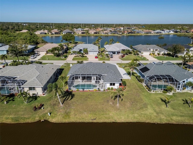 aerial view featuring a residential view and a water view