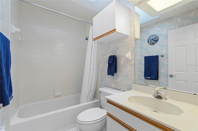 full bathroom with toilet, wallpapered walls, shower / bath combo, and vanity