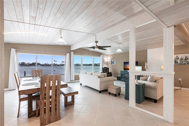 living room featuring light tile patterned floors, a ceiling fan, baseboards, beam ceiling, and wooden ceiling