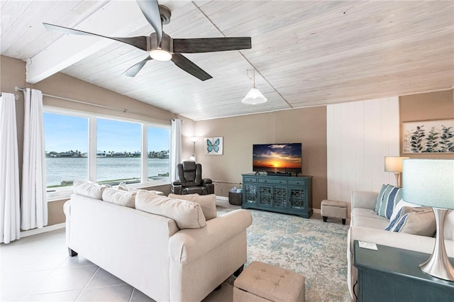 tiled living room featuring wooden ceiling, ceiling fan, and vaulted ceiling with beams