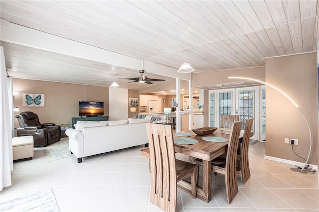 dining area featuring french doors, wooden ceiling, light tile patterned floors, baseboards, and ceiling fan