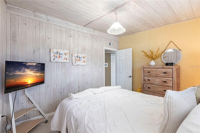 bedroom with visible vents and wood ceiling