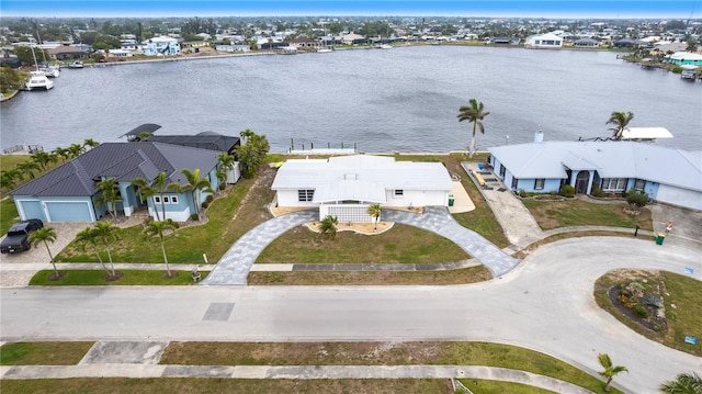 aerial view featuring a residential view and a water view