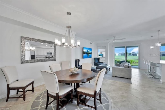 dining space with light tile patterned floors, baseboards, and ornamental molding