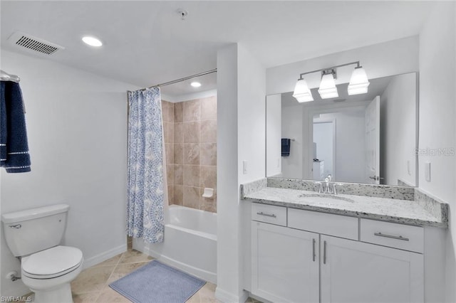 full bath featuring vanity, visible vents, baseboards, tile patterned flooring, and toilet