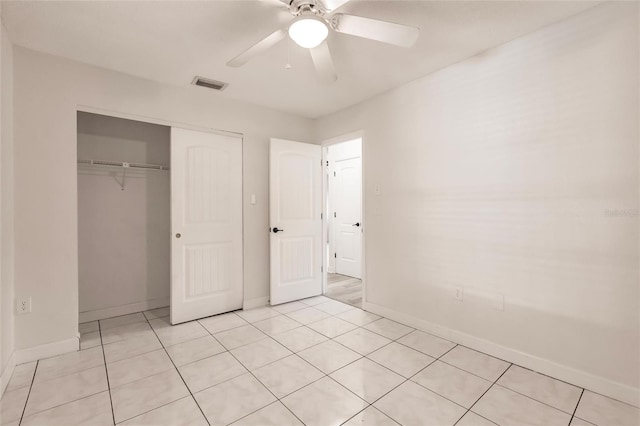 unfurnished bedroom featuring a closet, visible vents, ceiling fan, and baseboards