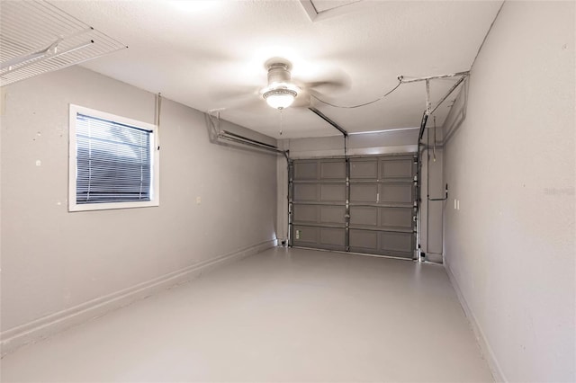 garage featuring baseboards