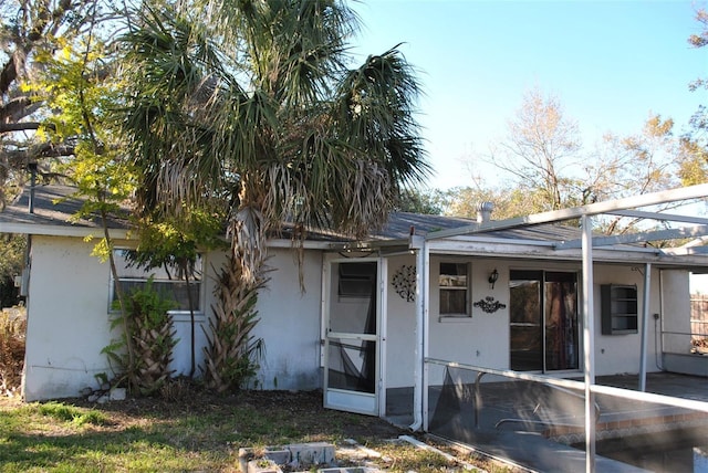 exterior space with stucco siding