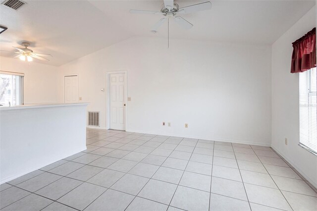 3436 Discovery Dr, Punta Gorda, FL 33983 - unfurnished room with lofted ceiling, visible vents, ceiling fan, and plenty of natural light