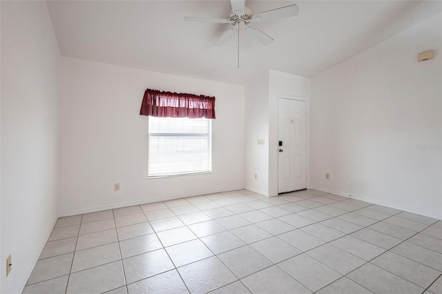 3436 Discovery Dr, Punta Gorda, FL 33983 - empty room with light tile patterned flooring, baseboards, and ceiling fan