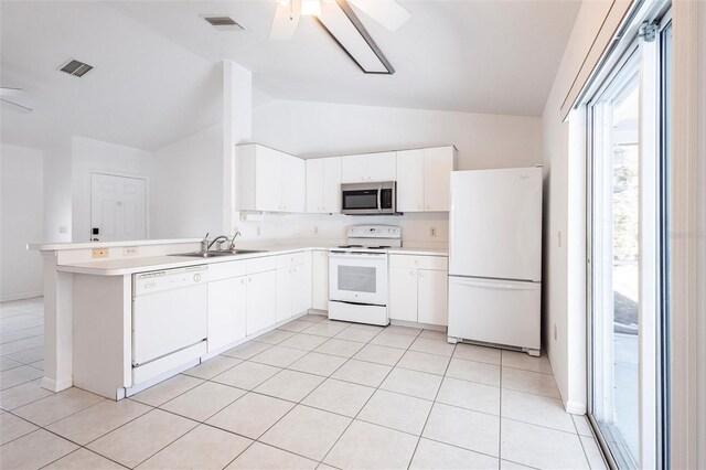 3436 Discovery Dr, Punta Gorda, FL 33983 - kitchen featuring vaulted ceiling, a ceiling fan, a sink, and white appliances